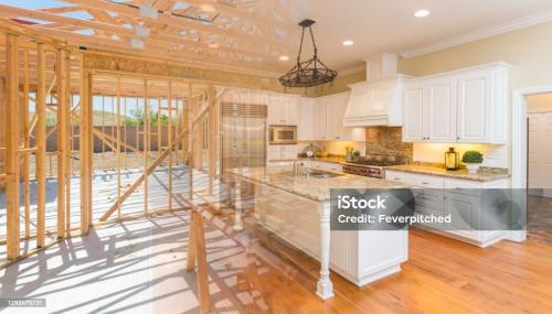 House Construction Framing Gradating Into Finished Kitchen Build.